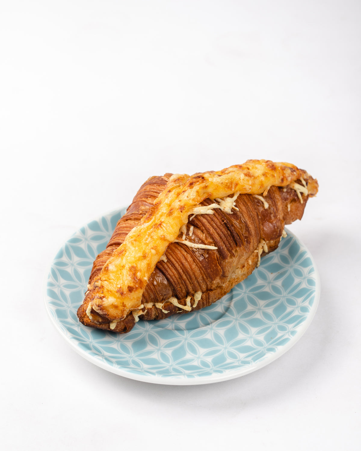 Croissant de queso gruyere